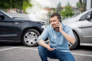 Man Reporting Car Accident - Out-Of-State Drivers
